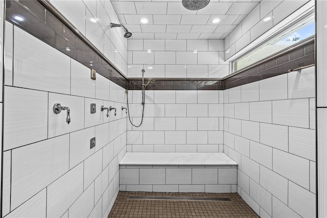 170 SW 80th St, Ocala, FL 34476 - bathroom with a tile shower, recessed lighting, tile patterned flooring, and tile walls