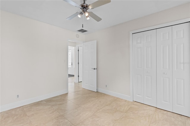 170 SW 80th St, Ocala, FL 34476 - unfurnished bedroom featuring baseboards, a closet, and a ceiling fan
