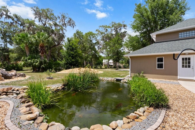 170 SW 80th St, Ocala, FL 34476 - view of yard with a garden pond