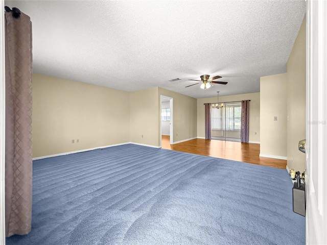 6263 SW 107th St, Ocala, FL 34476 - unfurnished room featuring baseboards, visible vents, carpet, and ceiling fan with notable chandelier