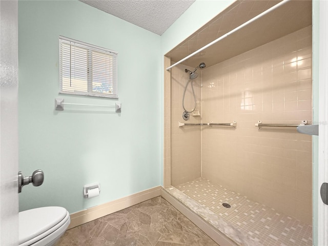 6263 SW 107th St, Ocala, FL 34476 - full bath with toilet, marble finish floor, a textured ceiling, baseboards, and tiled shower