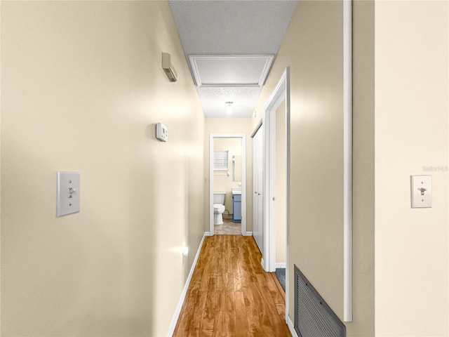 6263 SW 107th St, Ocala, FL 34476 - hall with baseboards and wood finished floors