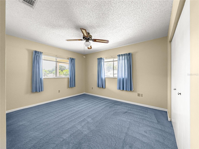 6263 SW 107th St, Ocala, FL 34476 - carpeted empty room featuring baseboards, visible vents, and plenty of natural light