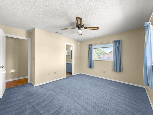 6263 SW 107th St, Ocala, FL 34476 - unfurnished bedroom with a textured ceiling, carpet, baseboards, and visible vents