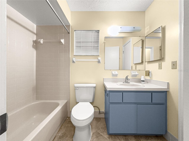 6263 SW 107th St, Ocala, FL 34476 - full bathroom featuring toilet, shower / tub combination, a textured ceiling, baseboards, and vanity