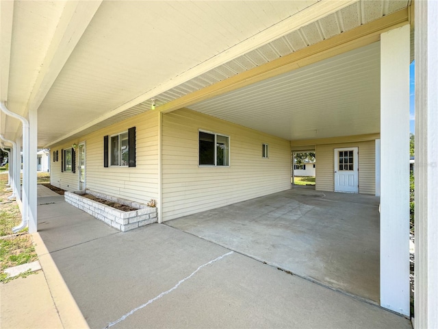 6263 SW 107th St, Ocala, FL 34476 - view of patio featuring a carport
