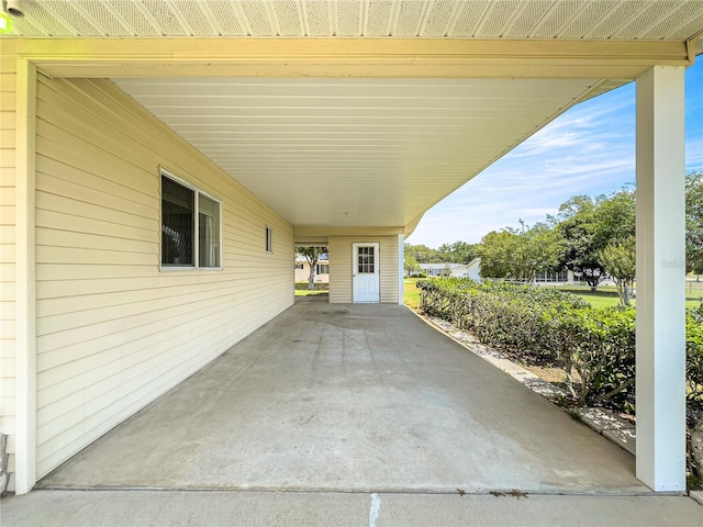 6263 SW 107th St, Ocala, FL 34476 - view of patio featuring a carport