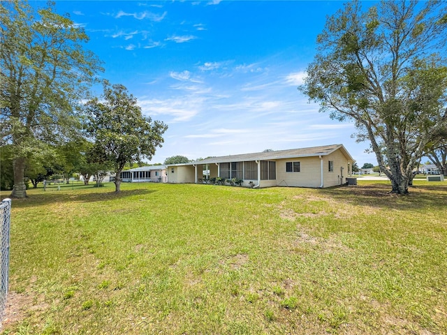 6263 SW 107th St, Ocala, FL 34476 - view of yard with a sunroom