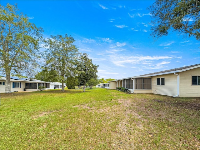 6263 SW 107th St, Ocala, FL 34476 - view of yard with a sunroom