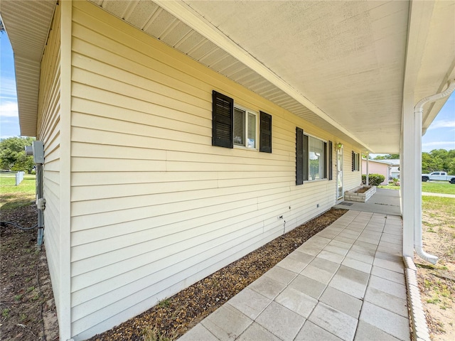 6263 SW 107th St, Ocala, FL 34476 - view of side of home featuring a porch