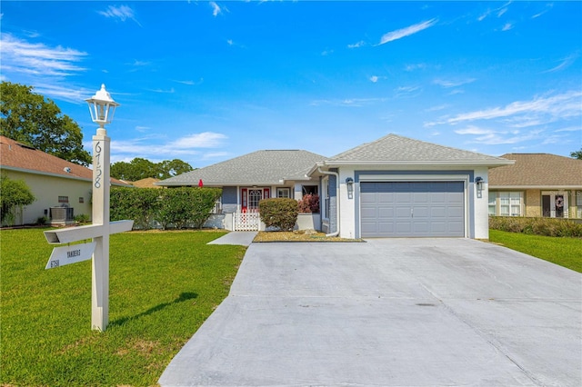 6758 SW 114th Street Rd, Ocala, FL 34476 - ranch-style house featuring a front yard, a garage, stucco siding, and driveway