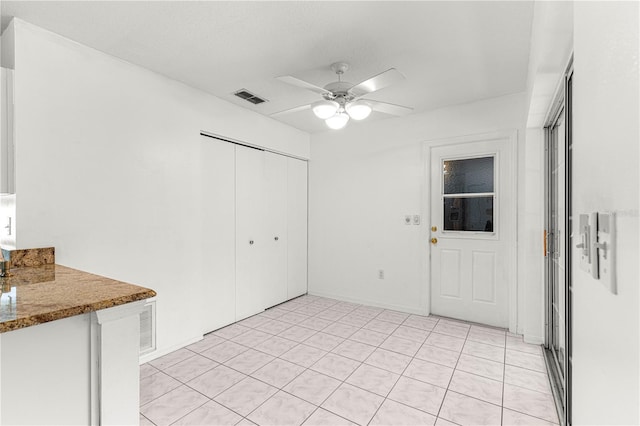 6758 SW 114th Street Rd, Ocala, FL 34476 - interior space with light tile patterned floors, ceiling fan, and visible vents