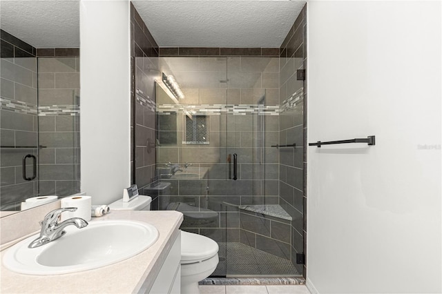 6758 SW 114th Street Rd, Ocala, FL 34476 - bathroom featuring toilet, a textured ceiling, tile patterned flooring, a shower stall, and vanity