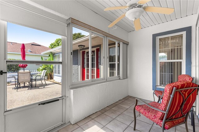 6758 SW 114th Street Rd, Ocala, FL 34476 - sunroom with outdoor dining space and ceiling fan