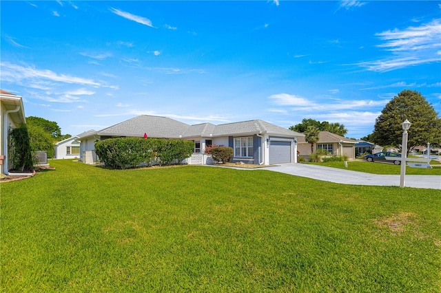 6758 SW 114th Street Rd, Ocala, FL 34476 - ranch-style house featuring concrete driveway, an attached garage, and a front lawn
