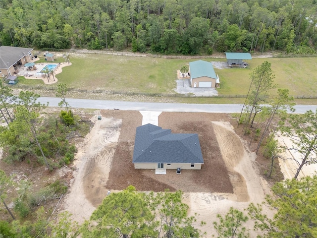 23131 SW Rainelle Rd, Dunnellon, FL 34431 - view of subject property featuring a forest and a pool area