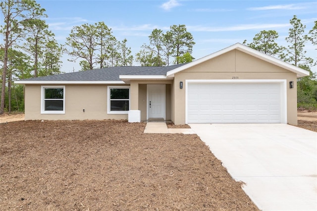 23131 SW Rainelle Rd, Dunnellon, FL 34431 - ranch-style home featuring stucco siding, concrete driveway, a garage, and roof with shingles