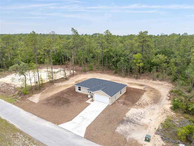 23131 SW Rainelle Rd, Dunnellon, FL 34431 - view from above of property with a heavily wooded area