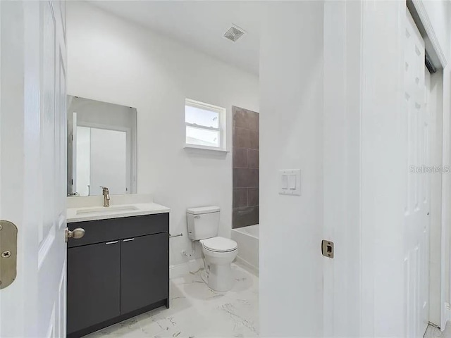 4415 SW 169th Lane Rd, Ocala, FL 34473 - full bath featuring toilet, visible vents, baseboards, marble finish floor, and vanity