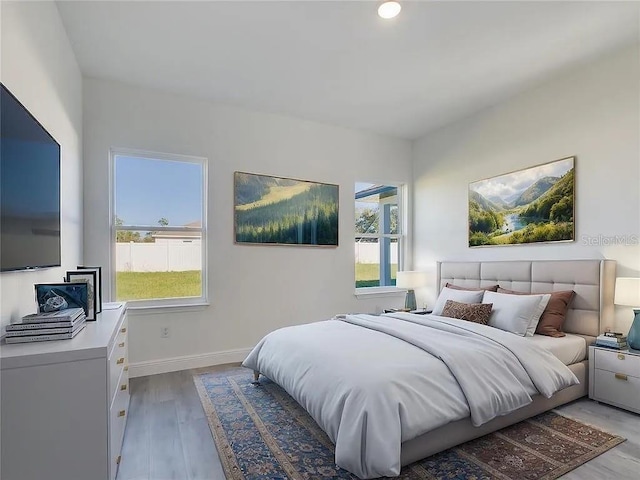 4415 SW 169th Lane Rd, Ocala, FL 34473 - bedroom with recessed lighting, baseboards, and light wood-style floors