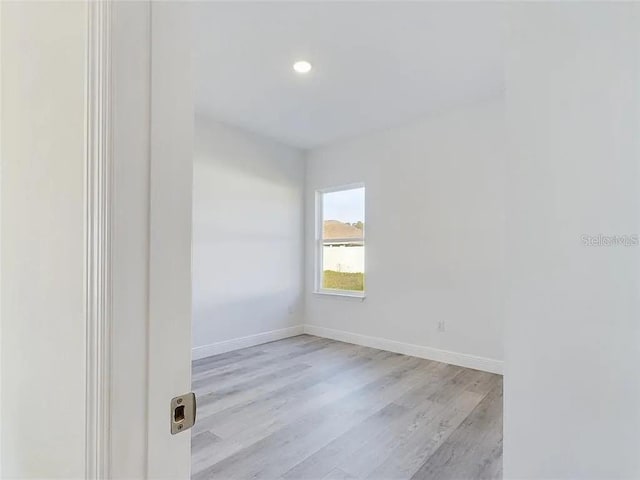 4415 SW 169th Lane Rd, Ocala, FL 34473 - unfurnished room featuring baseboards, recessed lighting, and wood finished floors