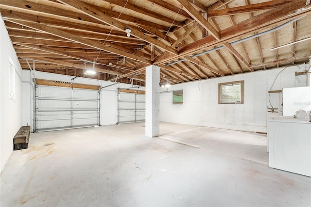 garage with washer and dryer