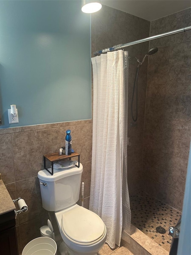 79 S Harrison St, Beverly Hills, FL 34465 - full bathroom featuring tile walls, toilet, a shower stall, and wainscoting