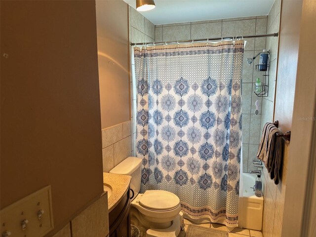 79 S Harrison St, Beverly Hills, FL 34465 - bathroom with tile walls, toilet, shower / bath combination with curtain, and vanity