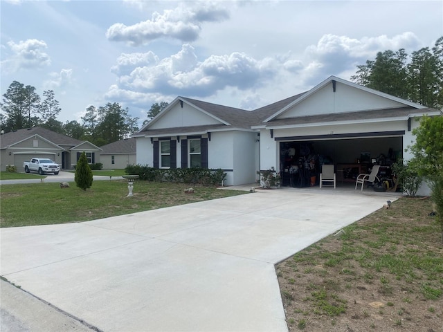 ranch-style house featuring driveway, stucco siding, a front lawn, and a garage