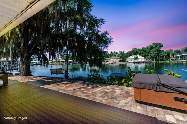 414 NW 8th Ave, Crystal River, FL 34428 - dock with a hot tub and a water view