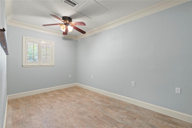414 NW 8th Ave, Crystal River, FL 34428 - empty room with crown molding, ceiling fan, light wood-style flooring, and baseboards