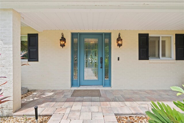 414 NW 8th Ave, Crystal River, FL 34428 - view of exterior entry featuring a porch