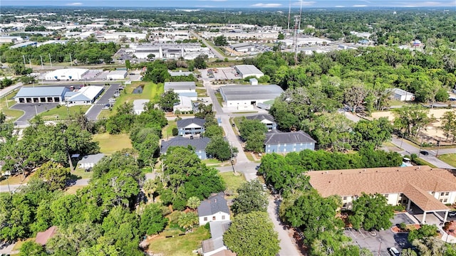 aerial overview of property's location with nearby suburban area
