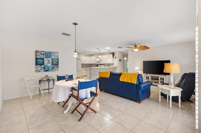 1736 Watts Mill Way, The Villages, FL 32162 - dining room with a ceiling fan and light tile patterned flooring