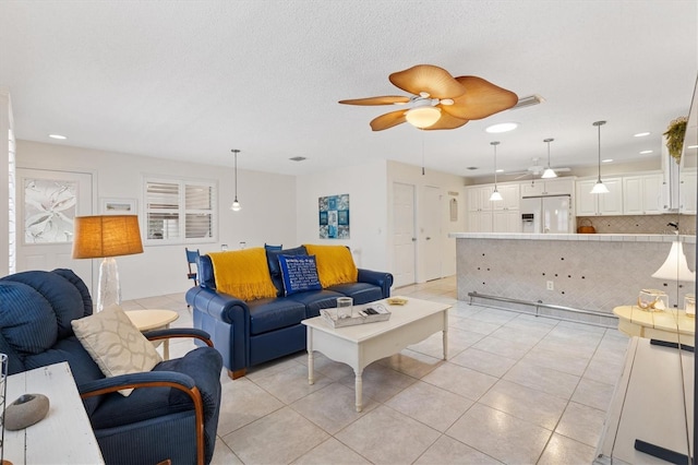 1736 Watts Mill Way, The Villages, FL 32162 - living area featuring a ceiling fan, recessed lighting, and light tile patterned flooring