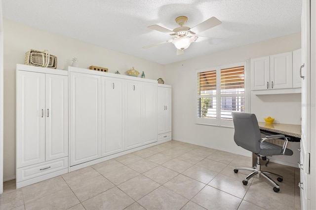 1736 Watts Mill Way, The Villages, FL 32162 - office featuring a textured ceiling, a ceiling fan, and light tile patterned flooring