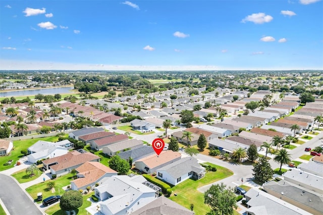 1736 Watts Mill Way, The Villages, FL 32162 - aerial perspective of suburban area with a nearby body of water