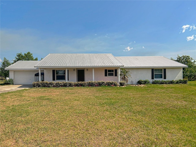 258 NW 122nd Ave, Oxford, FL 34484 - single story home featuring stucco siding, a garage, a front lawn, metal roof, and driveway