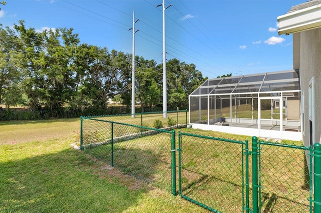 view of yard with a gate