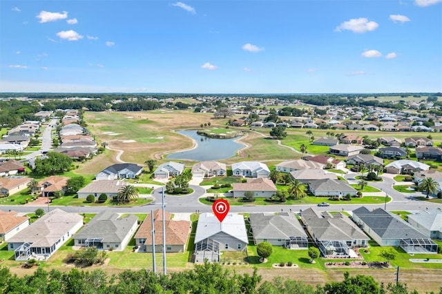aerial perspective of suburban area featuring a large body of water