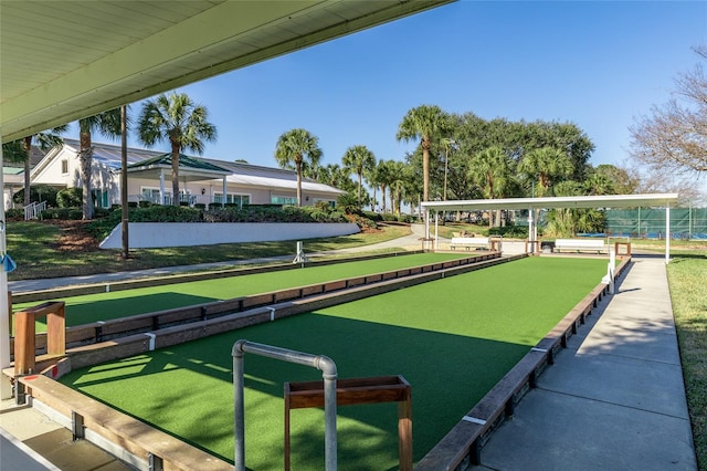 surrounding community with a bocce ball area