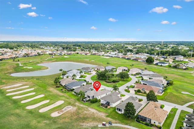 aerial overview of property's location with nearby suburban area and a nearby body of water