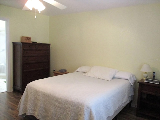bedroom featuring a ceiling fan and wood finished floors