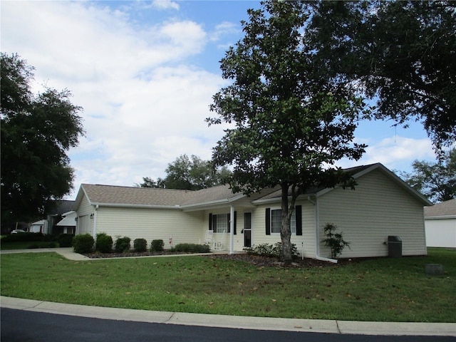 ranch-style home with a front lawn