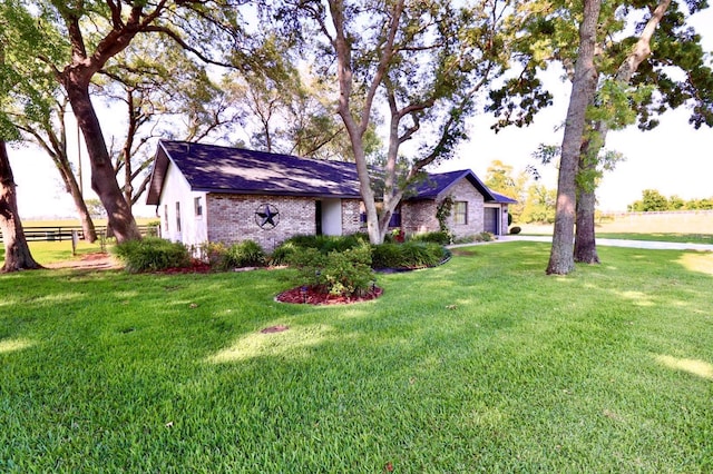 5351 SW 80th Pl, Ocala, FL 34476 - view of front of property with brick siding, an attached garage, and concrete driveway