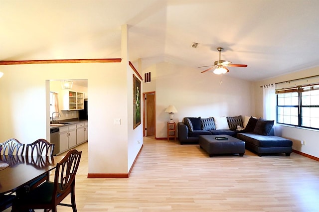5351 SW 80th Pl, Ocala, FL 34476 - living area featuring light wood finished floors, ceiling fan, baseboards, and lofted ceiling