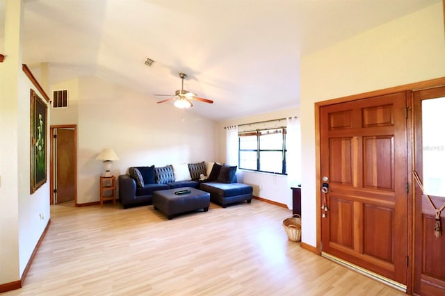 5351 SW 80th Pl, Ocala, FL 34476 - living area with baseboards, lofted ceiling, ceiling fan, and light wood finished floors