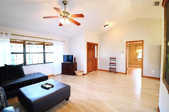 5351 SW 80th Pl, Ocala, FL 34476 - living area featuring lofted ceiling, a ceiling fan, light wood-style floors, and baseboards