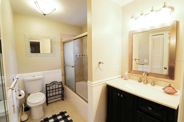 5351 SW 80th Pl, Ocala, FL 34476 - full bathroom with toilet, tile patterned flooring, combined bath / shower with glass door, and vanity