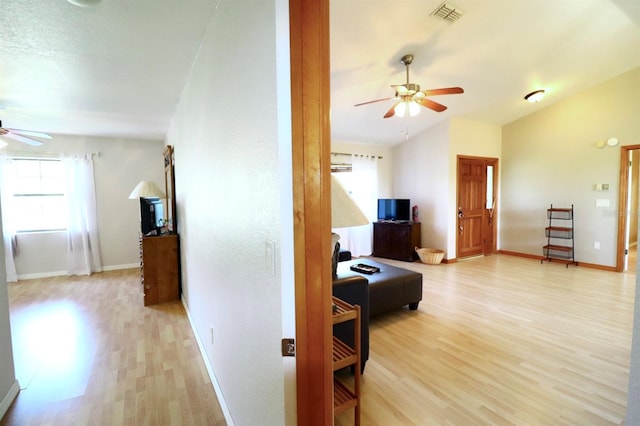 5351 SW 80th Pl, Ocala, FL 34476 - living area with ceiling fan, light wood-type flooring, baseboards, and lofted ceiling